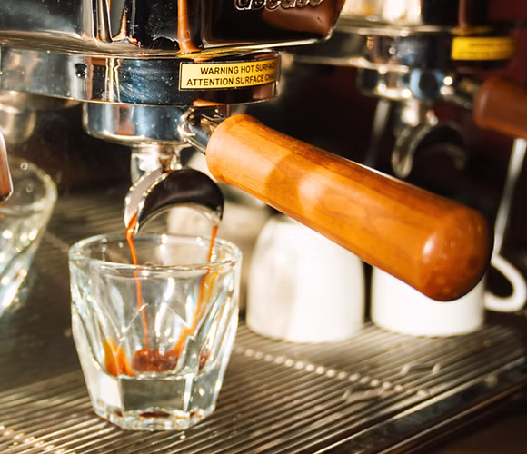 french press making coffee